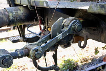 old, rusty trailer coupling from railway wagons
