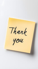 A yellow sticky note with the words "Thank You" written on it in black marker, isolated on a white background. Good for saying thanks and goodbye.