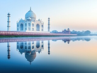 Fototapeta premium A stunning view of the Taj Mahal with its reflection in calm water during sunrise, showcasing its magnificent architecture and serene beauty.