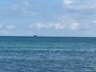 Fototapeta premium Sea, sky and little ship