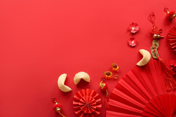 Chinese symbols with fortune cookies on red background. New Year celebration