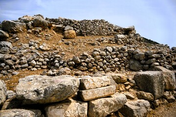 Remains of the fortification walls of Mycenae on Peloponnese in Greece. Mycenae was one of the largest citadels in Ancient Greece during the Bronze Age and played an important role in the Trojan War