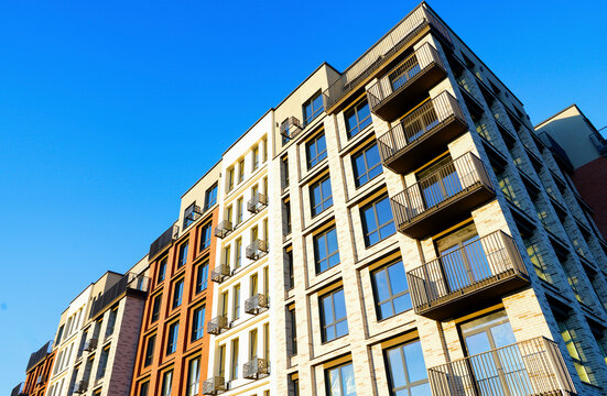 Modern facade building. Colorful high rise urban Modern house. Windows of Skyscraper. Architecture building exterior, window house block. High Rise house. Residential development in UK. City built.