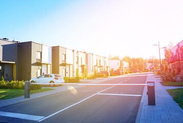 Automatic car barrier in Private urbanization residential area. Townhouses in Gated community. Modern townhouse with Apartment residential building. Car barrier at Entrance to Closed community.