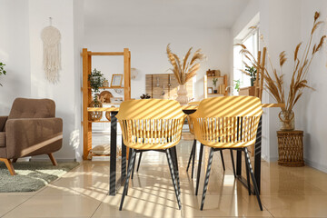 Interior of modern studio apartment with dining table
