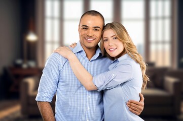 Fototapeta premium Happy, hug young couple posing at home