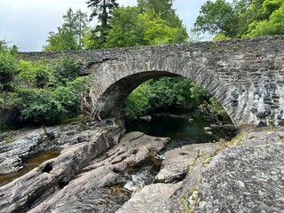 old stone bridge over the river