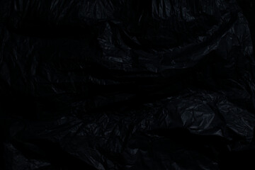 burning paper, glowing edge of paper on a black background
