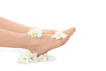 Young woman with flat feet and flowers isolated on white background, closeup