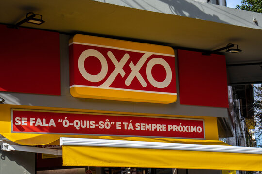 Sao Paulo, Brazil, March 15 2023. Front view of Oxxo supermarket in Sao Paulo city. Oxxo is popular Mexican chain of grocery stores or convenience stores