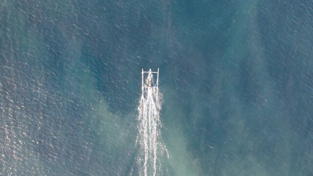 Indonesia, Bali, fishing boat returns from fishing in the morning, Amed, Karangasem, Bali, Indonesia