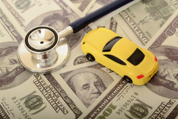 The dollar bills represent the financial burden of car ownership, including maintenance, insurance,...