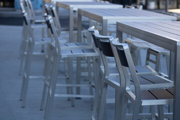 outdoor modern seating area with table and chairs