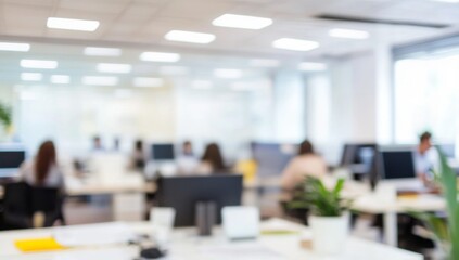 Blurred office interior with white walls and ceiling, people working in the background, light beige and yellow tones.