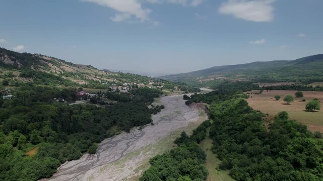 Stunning aerial drone footage of dried out river near a small village Ukur located in the Khizi District, near the Russian border, Azerbaijan, the Greater Caucasus mountain range, Central Asia, Asia