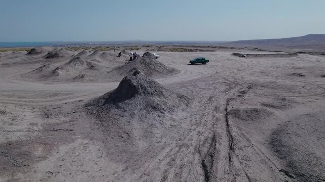 Stunning aerial drone footage of geological formations near Gobustan, part of one of the world's largest concentrations of mud volcanoes, Azerbaijan, Central Asia, Asia