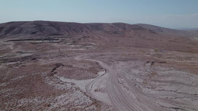 Stunning aerial drone footage of geological formations near Gobustan, part of one of the world's largest concentrations of mud volcanoes, Azerbaijan, Central Asia, Asia