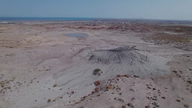 Stunning aerial drone footage of geological formations near Gobustan, part of one of the world's largest concentrations of mud volcanoes, Azerbaijan, Central Asia, Asia