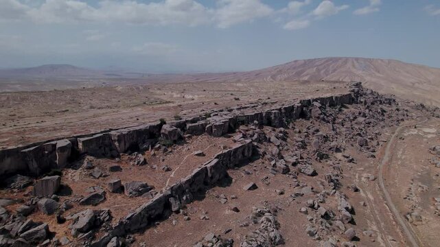 Stunning aerial drone footage of The Gobustan Rock Formations, the Gobustan National Park, UNESCO World Heritage Site, Azerbaijan, Central Asia, Asia