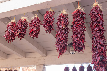 A bunch of drying peppers