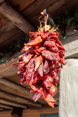 A bunch of drying peppers