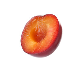 Half of ripe plum isolated on white