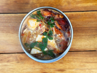Close up of Thai Tomyum with prawn and mushroom
