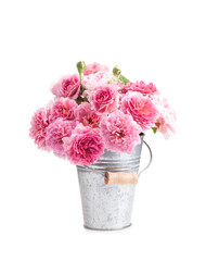 English roses in a vase on a white background