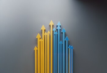 Obraz premium Multiple yellow and blue arrows point upwards on a gray background.