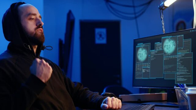 Hacker excited after finally developing zero day exploit undetectable by antivirus software installed on systems. Rogue programmer happy to successfully trick firewalls, celebrating accomplishment