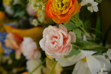 Artificial flowers as a background. Flower texture background