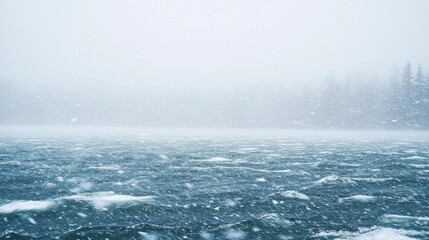 Naklejka premium Dramatic Snowstorm View Over Choppy Waters