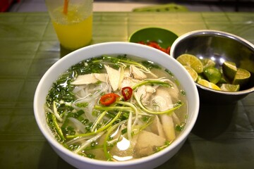 Vietnamese cuisine (rice noodles with chicken) cooked at the local restaurant