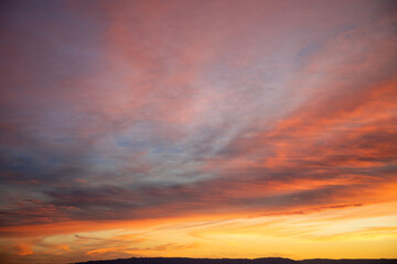 Obraz premium Dynamic sunset pastel and orange colors in mountain west Wyoming