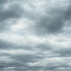 Obraz premium A view of an overcast sky with a thick layer of gray clouds.