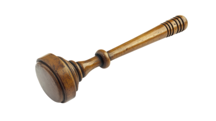 An antique brass wrench isolated on a white background, surrounded by old metal tools and a wooden plug, evoking the essence of classic car engine equipment