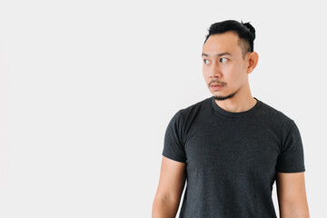 Normal face Asian freelance man bun hair in black on white.