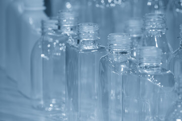 The various  shape of PET bottle in the light blue scene.