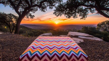 Breathtaking Sunset Over Mountainous Landscape with Lush Forestry and Serene Lake