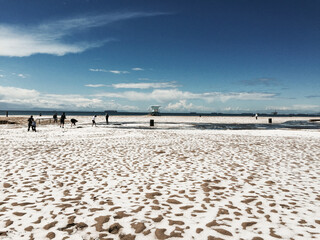 Fototapeta premium Snow on the Beach in Huntington Beach California