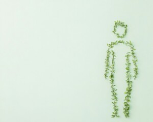 Obraz premium Leafy Human Silhouette on Minimalist Background Reflecting Natural Harmony