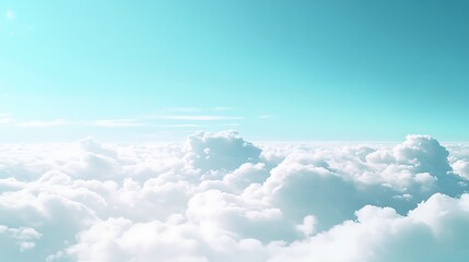 Naklejka premium A serene sky filled with soft, fluffy clouds under a bright, turquoise atmosphere, creating a peaceful and calming view.