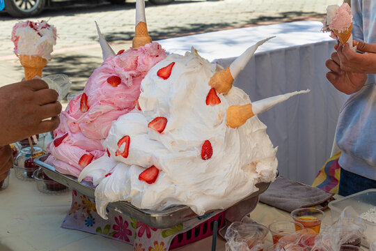 Espumilla de guayaba (guava foam) is a traditional Ecuadorian dessert made with egg whites and flavored with guava, served in ice cream cones.
