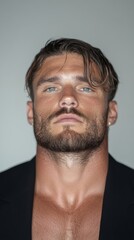 Fototapeta premium Confident Male Portrait with Strong Features and Stylish Attire