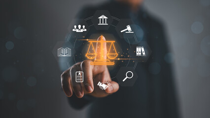 Legal Professional with Justice Icons. A suited legal professional touches virtual icons symbolizing law, justice, and legal services. business legislation, Notary public, legal advice online, Lawyer