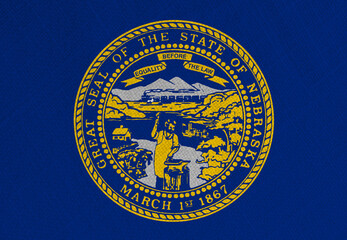 Flag of Nebraska, High Quality fabric and Grunge Image of Nebraska USA. USA states Nebraska Fabric flag.