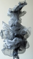 Fototapeta premium Abstract image of flowing grey and black fabric against a white background.