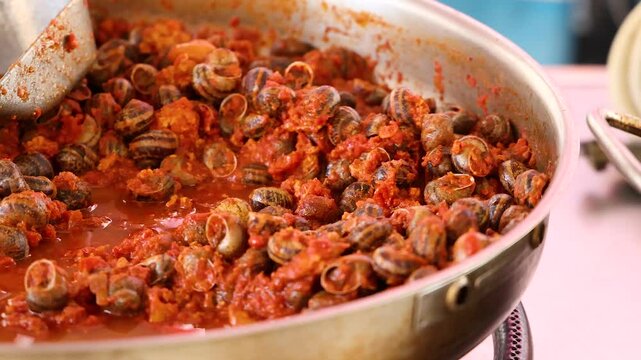 Cooking Escargot in Tomato Sauce