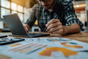 Close-up of business owner calculating e-commerce conversion rates, focus on digital tools, modern workspace