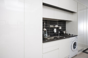 Modern kitchen with a washing machine